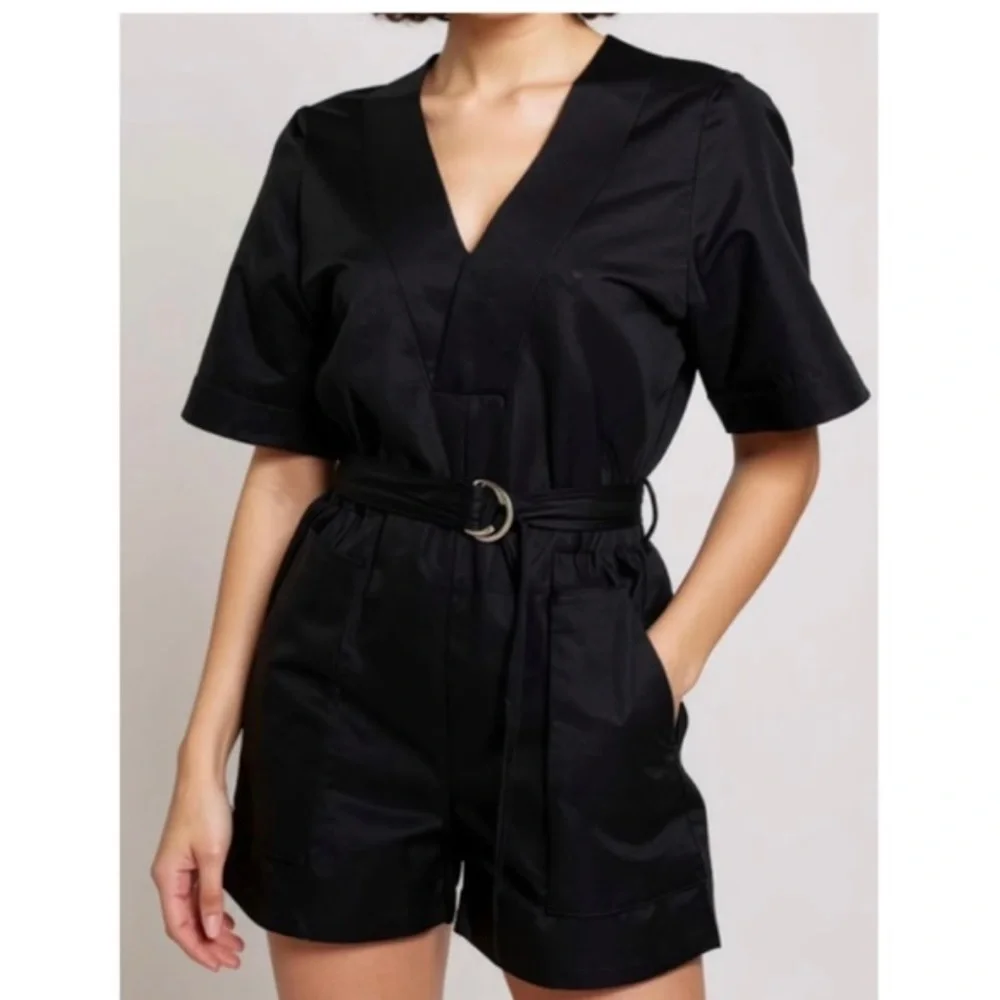 COS v neck belted playsuit 73% TENCEL Lyocell, 22% Linen, 5% Cotton.